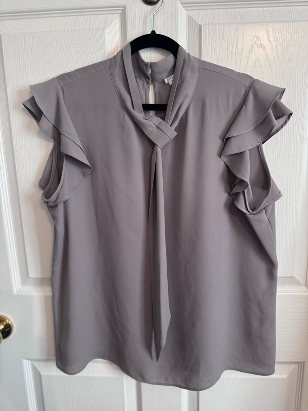 Flutter sleeve Tie neck blouse